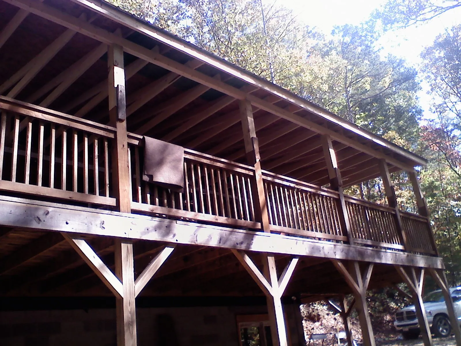 Timber framing under a new elevated porch and deck — Roof Leak Repair in Mount Holly by Roofing Brothers
